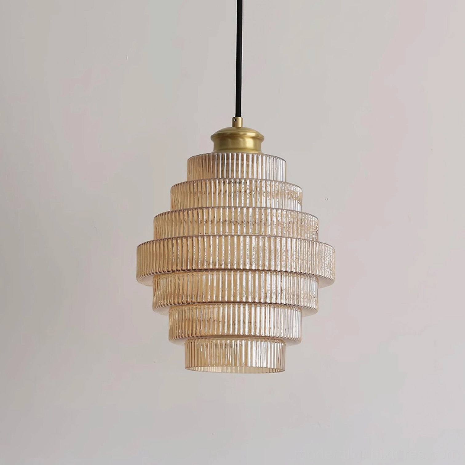Pair of ridged glass pendant lights flanking bed, bilateral symmetry bedroom design