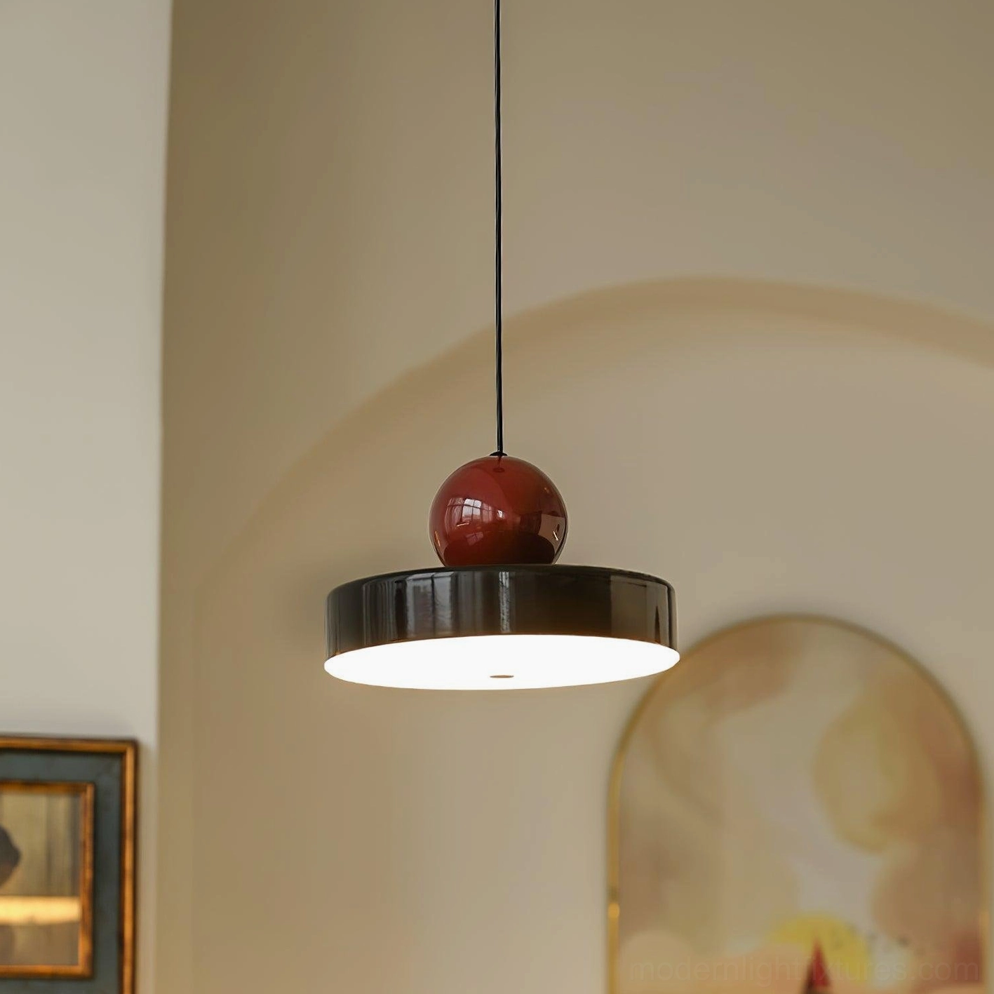 Pallade modern pendant with black disc and burgundy sphere, contemporary lighting fixture