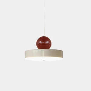 Pallade pendant light with burgundy sphere and white disc, minimalist modern design, studio view