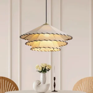 Japanese minimalist ruffled fabric pendant light in dining nook with paneled walls, creating warm wabi-sabi ambiance