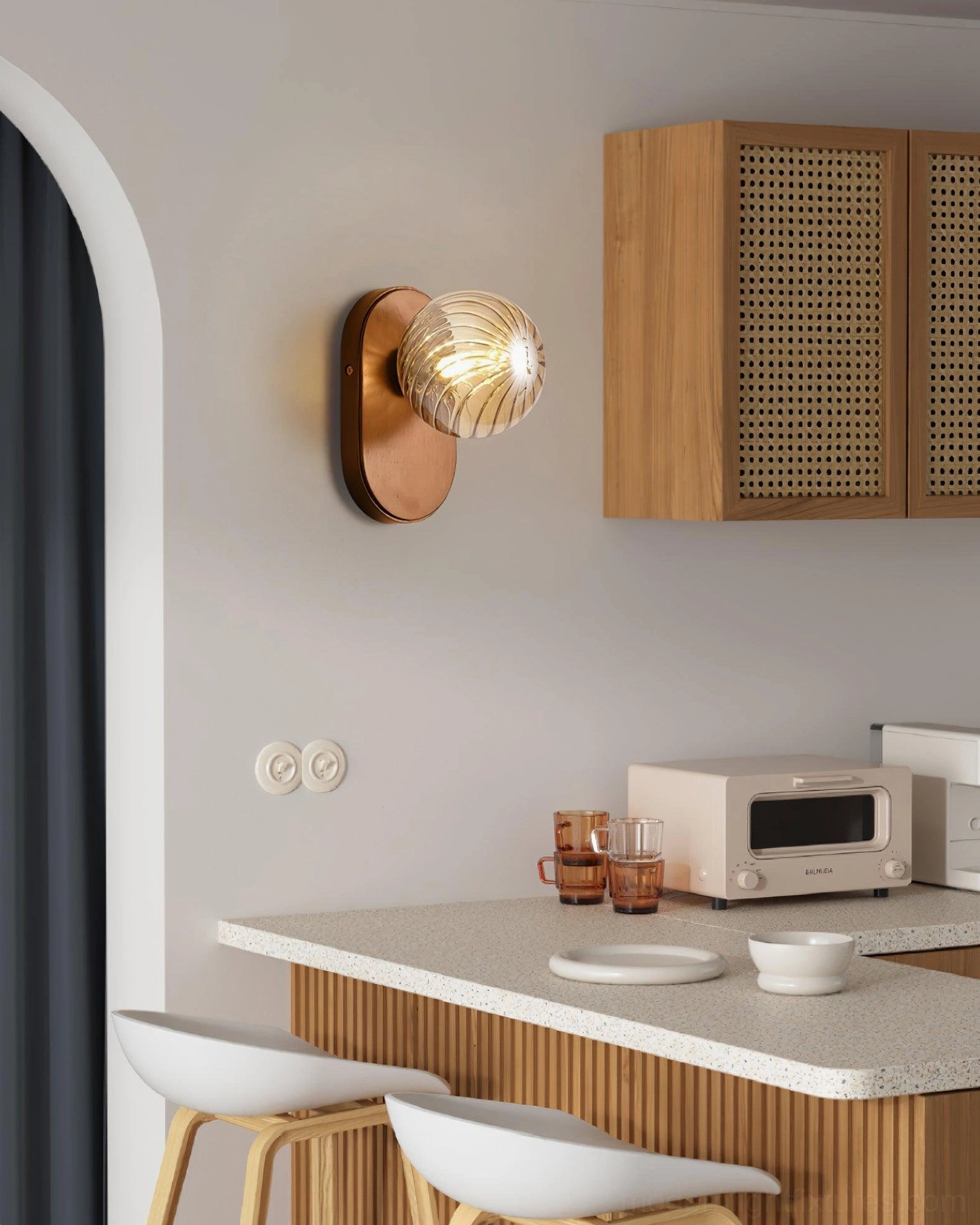 Paola orb wall lamp in industrial-modern space with exposed brick and steel accents