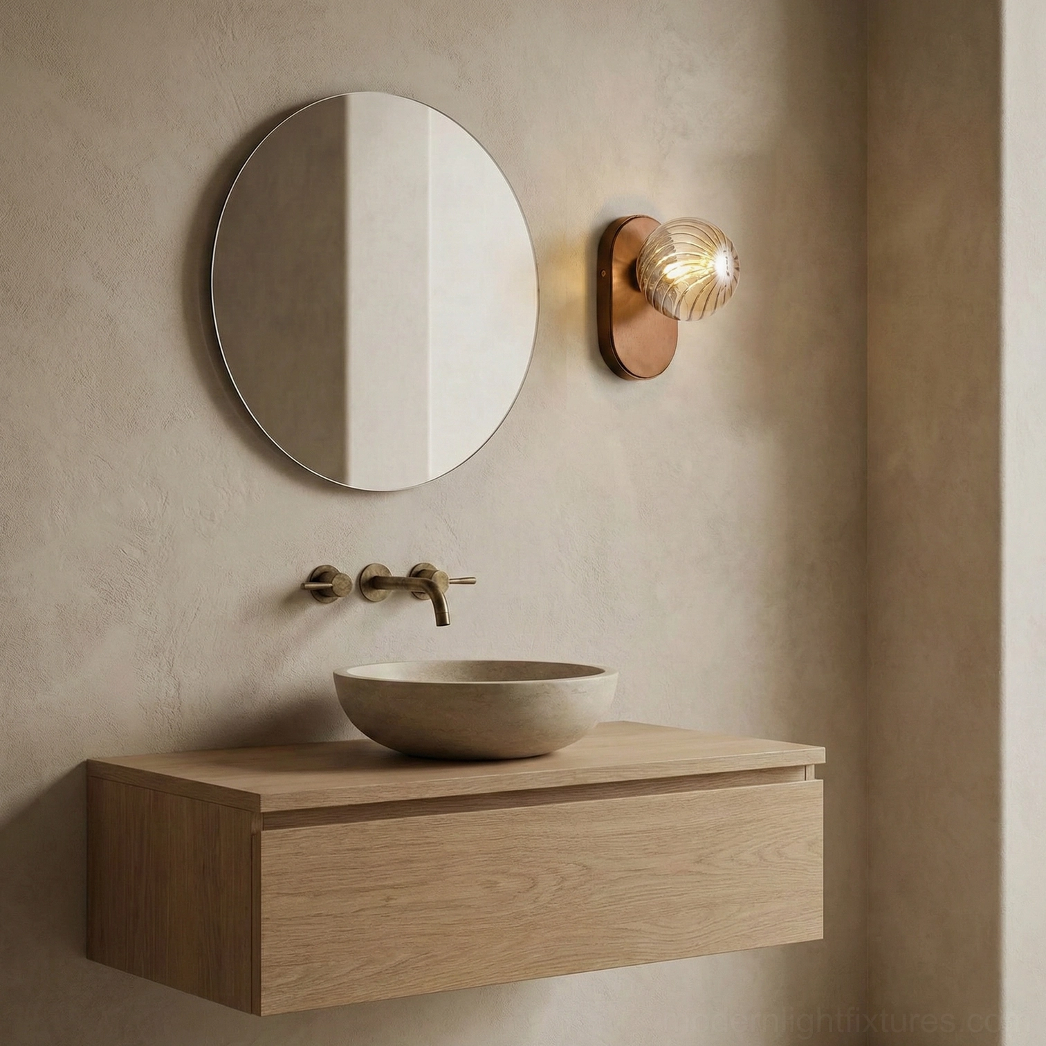 Paola wall sconce installed beside round mirror in compact minimalist floating vanity bathroom