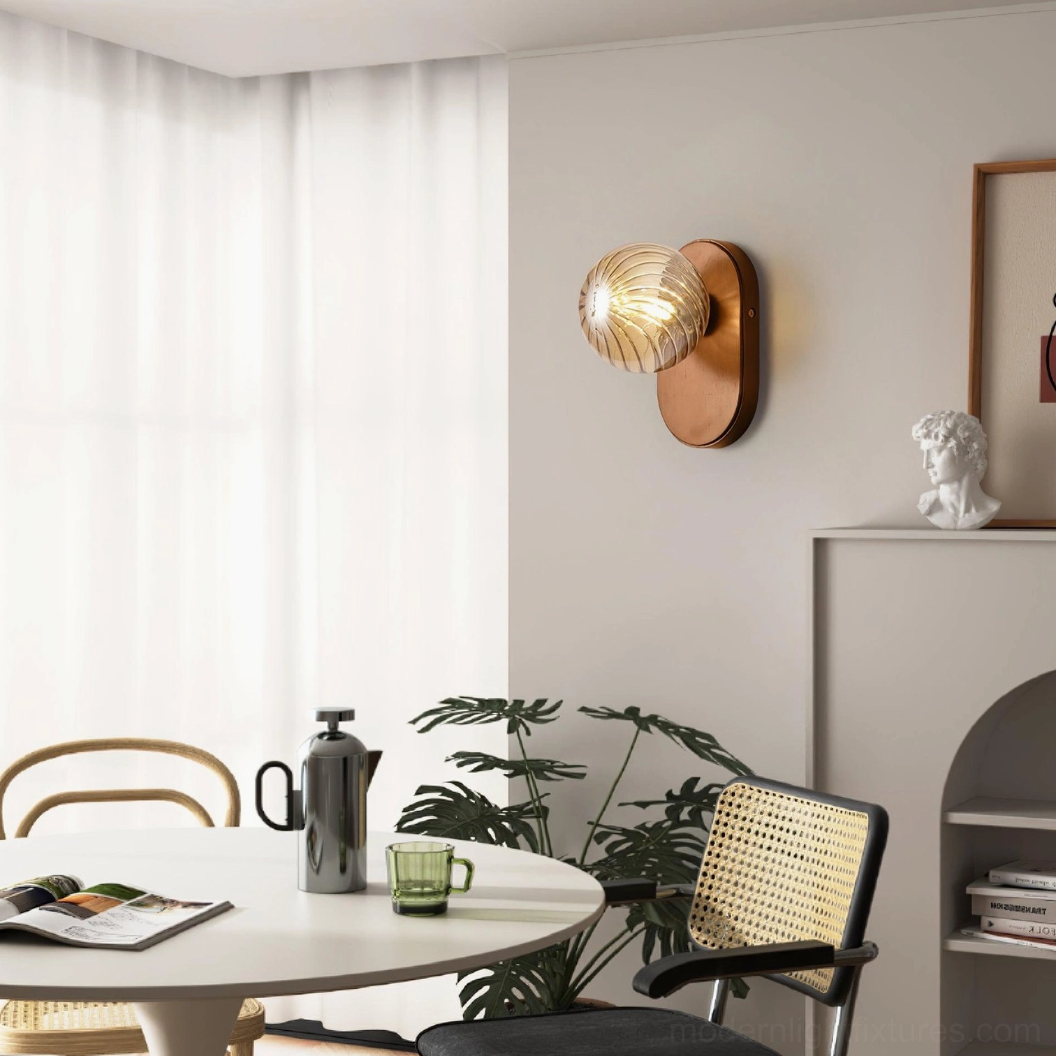 Contemporary trio of Paola wall sconces creating sculptural light installation on gallery wall