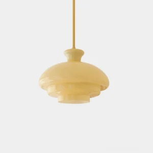 Paolina tiered glass pendant light with creamy beige frosted shade and brass suspension rod, front overhead view on minimalist white background
