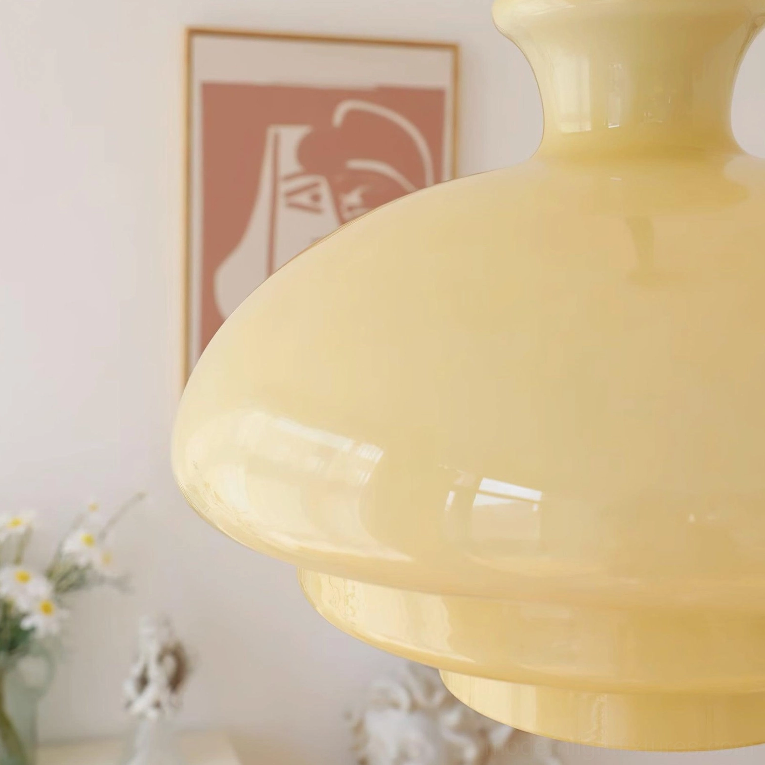 Paolina glass pendant light installed in kitchen island setting, multiple fixtures creating ambient lighting focal point