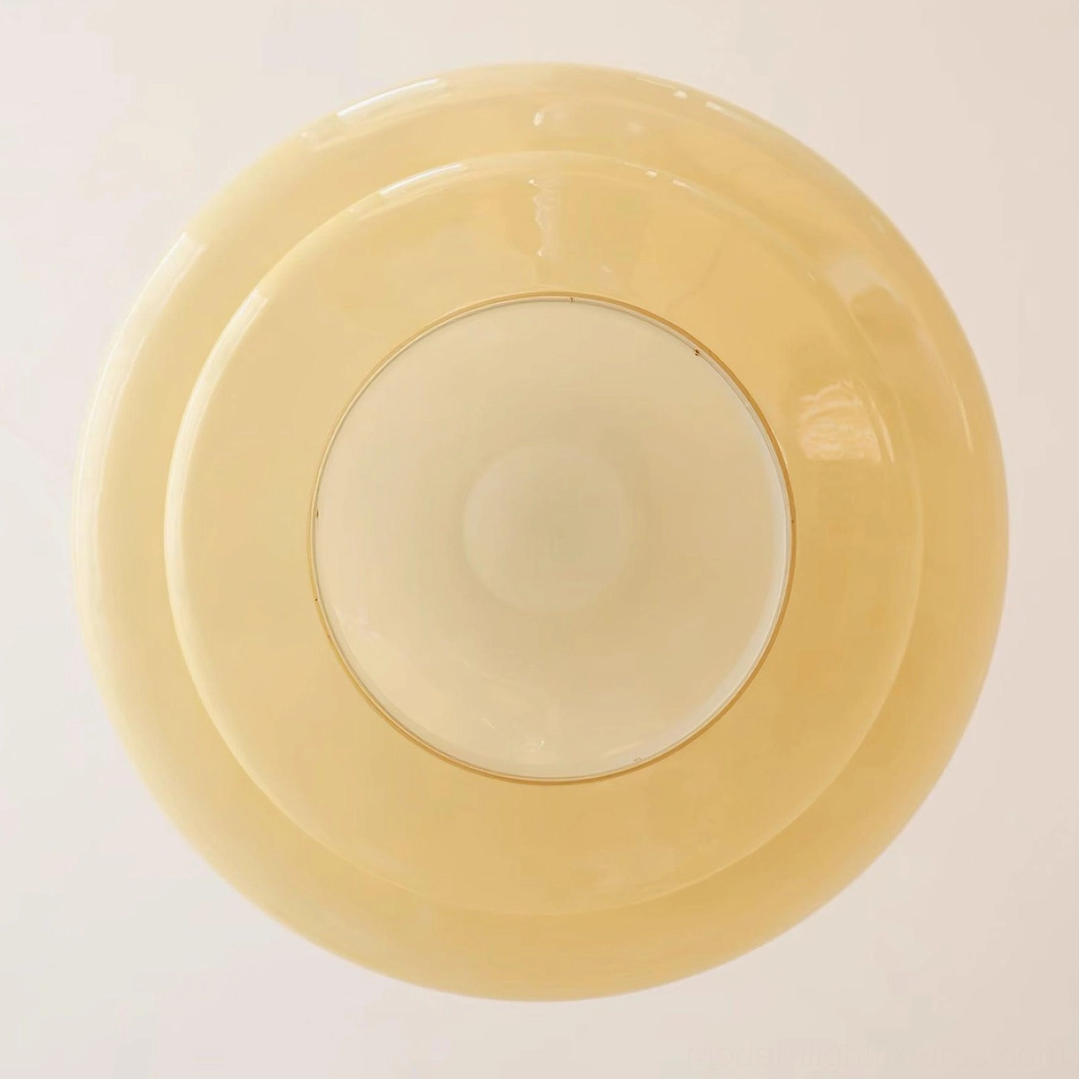 Paolina tiered glass pendant lamp bottom view showing layered glass dome and inner lamp cover, direct overhead perspective on white background