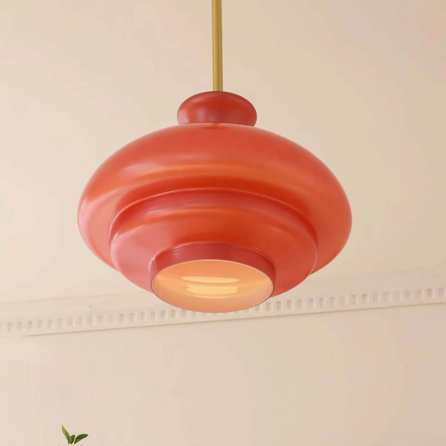 Paolina glass pendant light fixture showcasing brass metal components and coordinated design elements in home setting