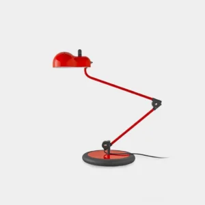 Paolo red articulated task table lamp with dual swing arms and automotive-inspired ventilation design, front three-quarter view on white studio backdrop