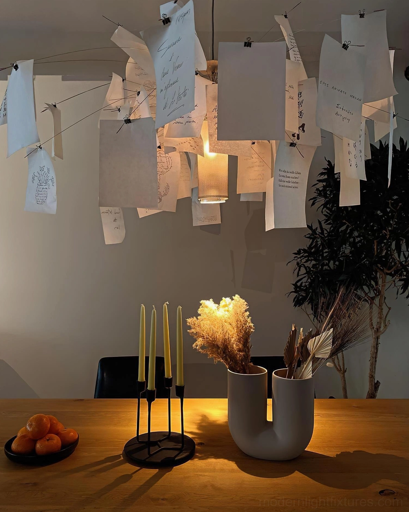 Modern paper light fixture close-up showing translucent paper quality and metal frame construction