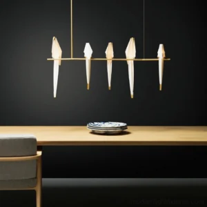 Warm glowing 5-light origami crane pendant chandelier above modern dining table