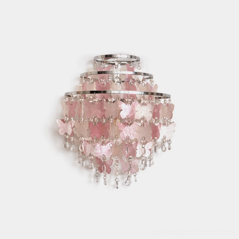 Papillia pink butterfly crystal wall sconce close-up frontal view with layered tiered crystal details and chrome frame