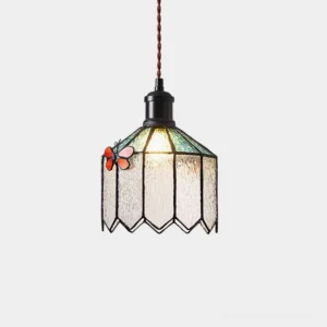 Papilune stained glass pendant light front view showing hand-assembled green and clear glass shade with coral butterfly motif