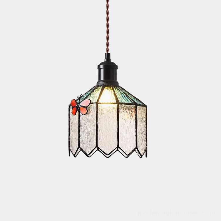 Papilune stained glass pendant light front view showing hand-assembled green and clear glass shade with coral butterfly motif