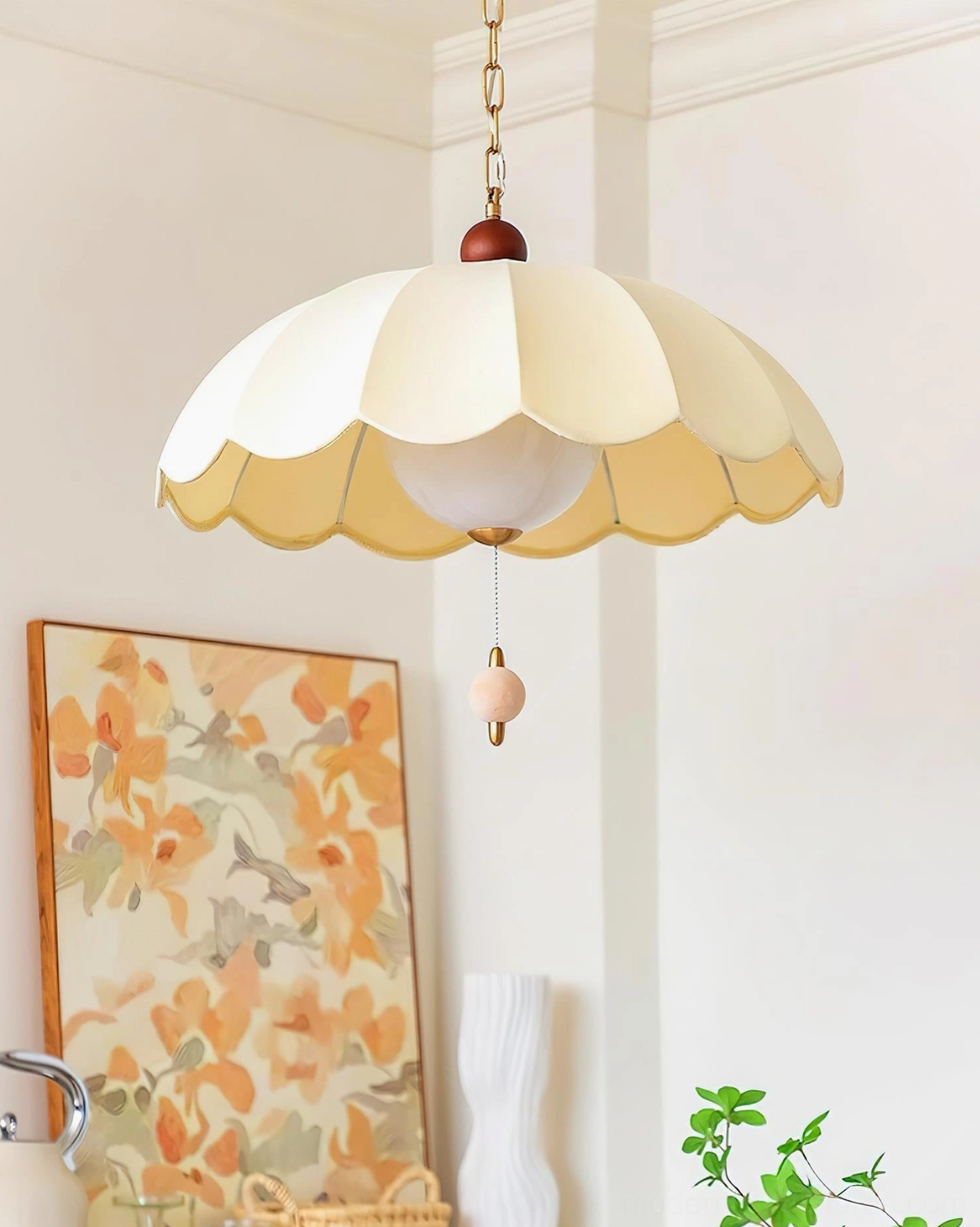 Paralune scalloped pendant lamp in cream white with pink-toned hanging bead, overhead interior view