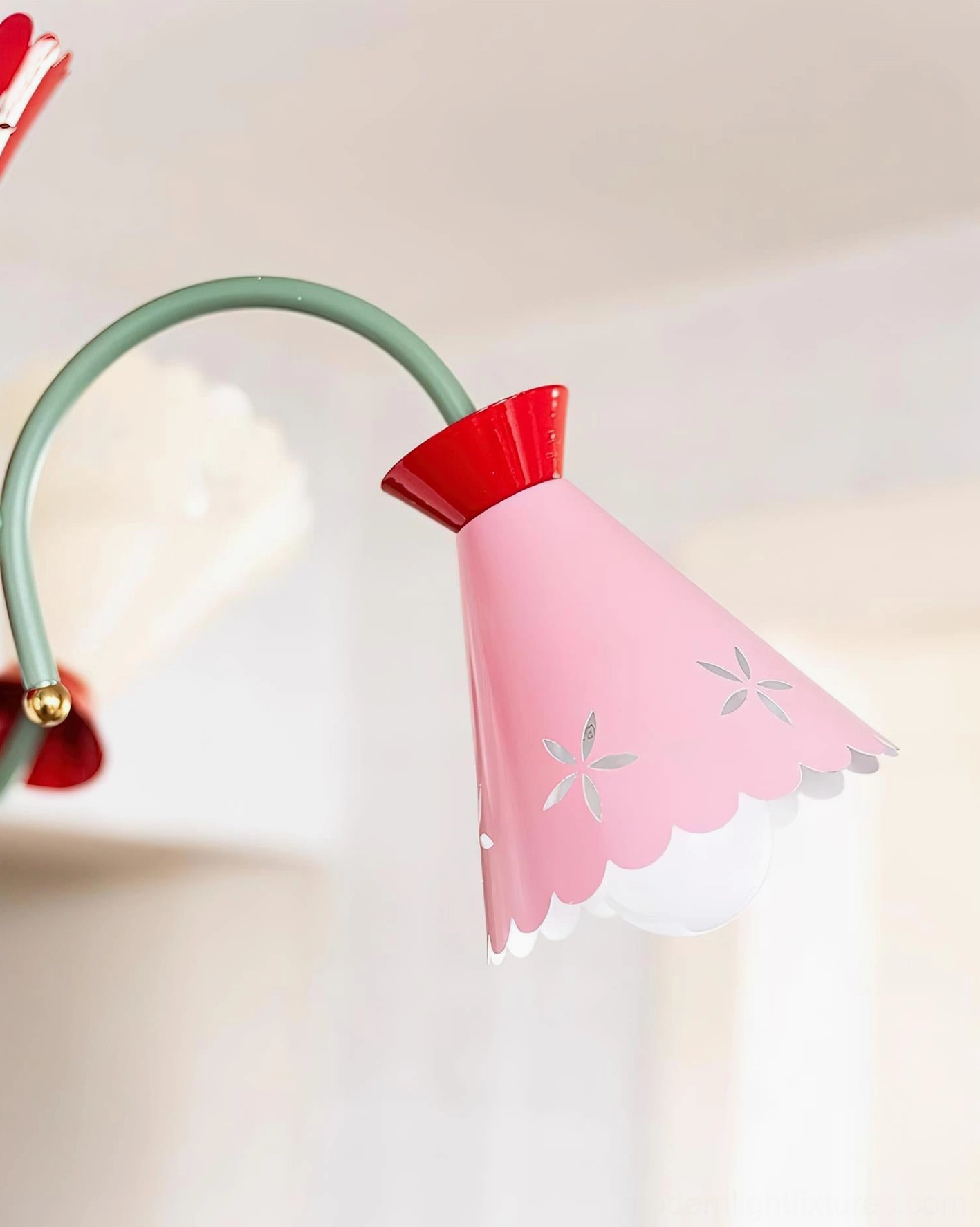 Pastel 5-arm chandelier with scalloped flower-cut metal shades featuring multicolor finishing in contemporary eclectic room setting
