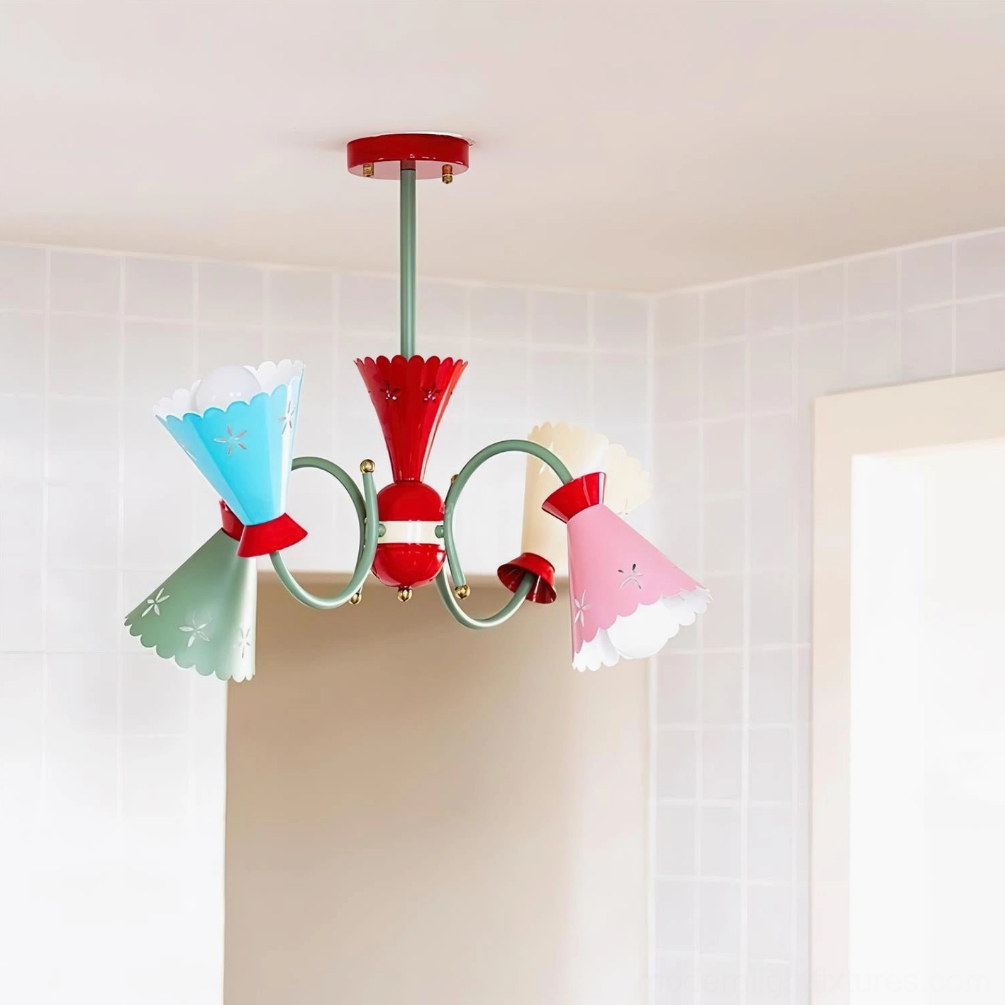 Three-quarter side angle of pastel chandelier in tiled interior room highlighting unique shade angle and vintage retro-modern styling