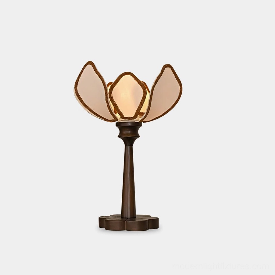 Pauline lotus floral table lamp with walnut wooden base and beige fabric petals, studio front view against white backdrop