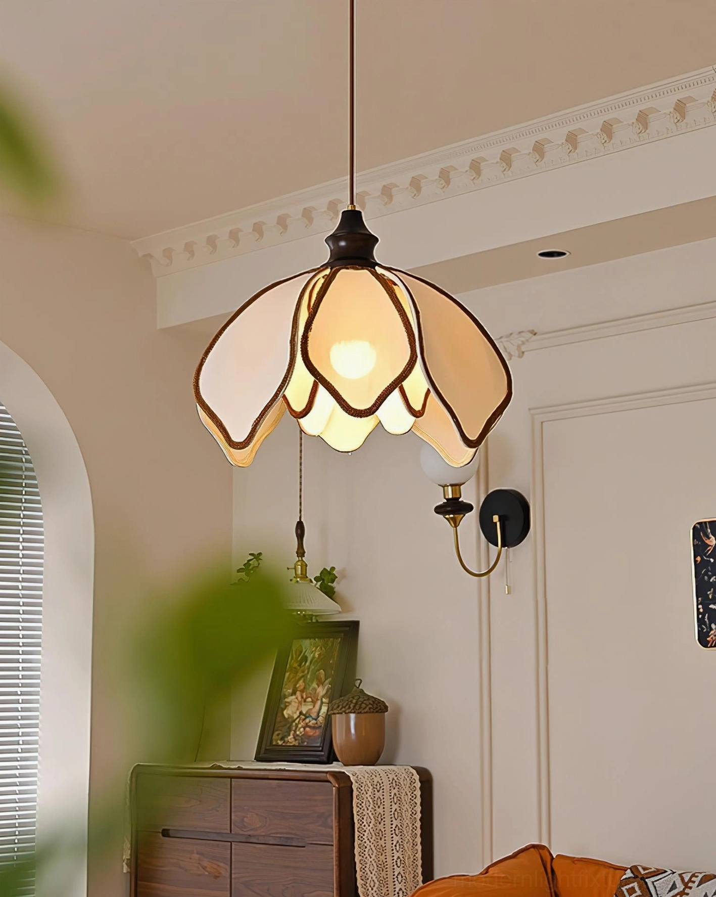 Pauline petal pendant light side view in bedroom with arched doorway, matches retro interior decor, ambient lighting