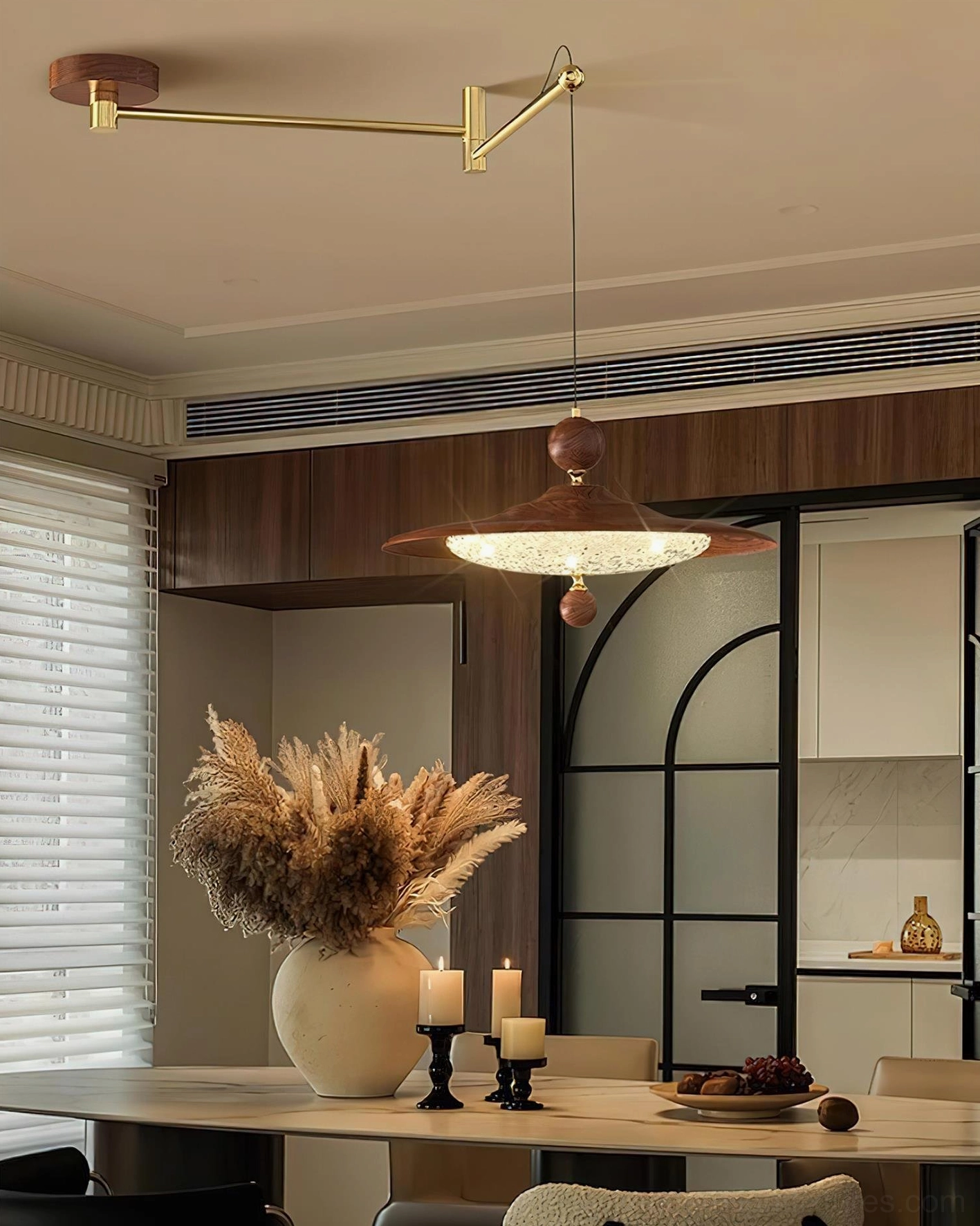 Contemporary swing arm pendant light in modern dining space, warm 3000K LED lighting with brass hardware accents, functional task lighting fixture