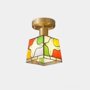 Peace Dove stained glass ceiling light fixture with brass frame, front close-up view