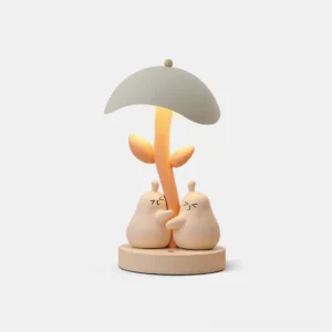 Pear Hug resin table lamp front view with cute pear-shaped design and matte finish on white background