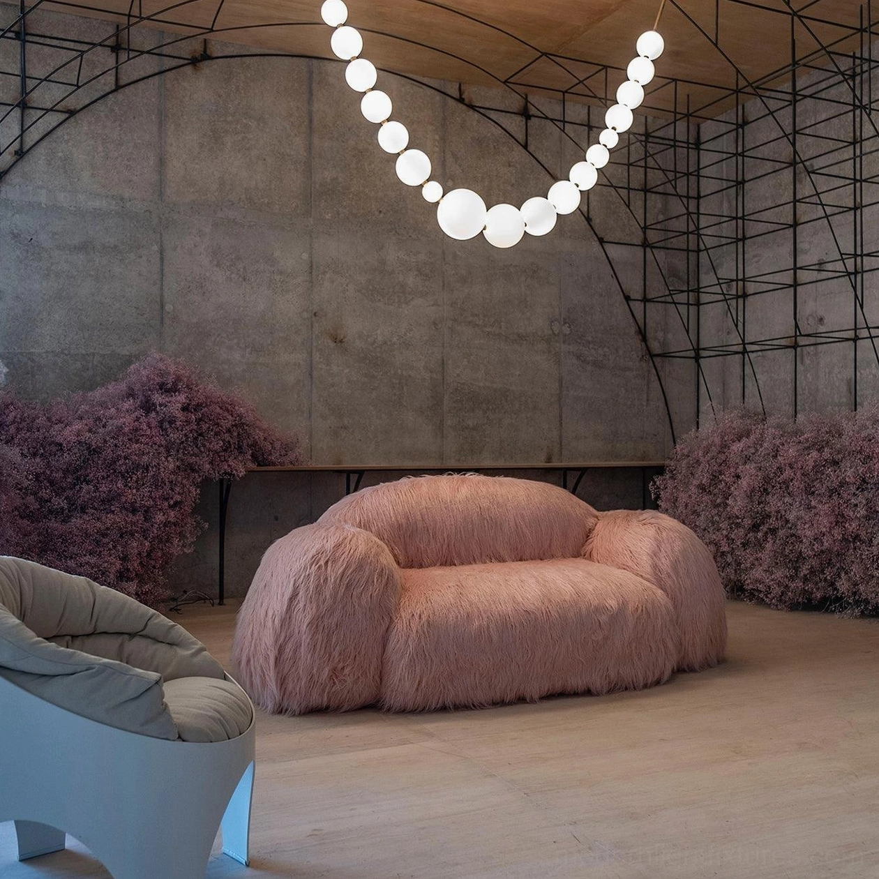 Contemporary pearl necklace light fixture showing multiple hanging strands and modular sphere configuration