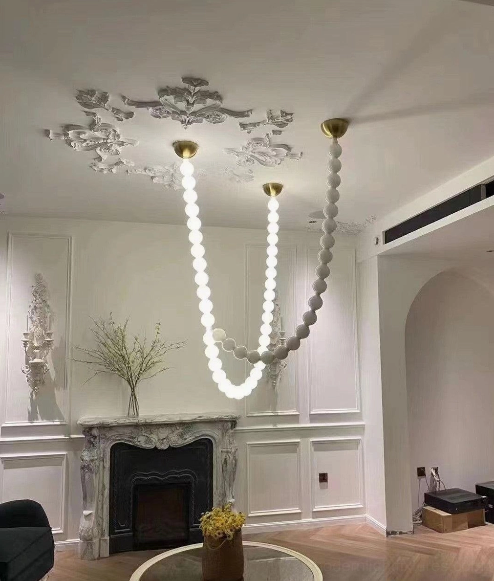 Pearl string pendant light detail highlighting LED technology and acrylic sphere craftsmanship