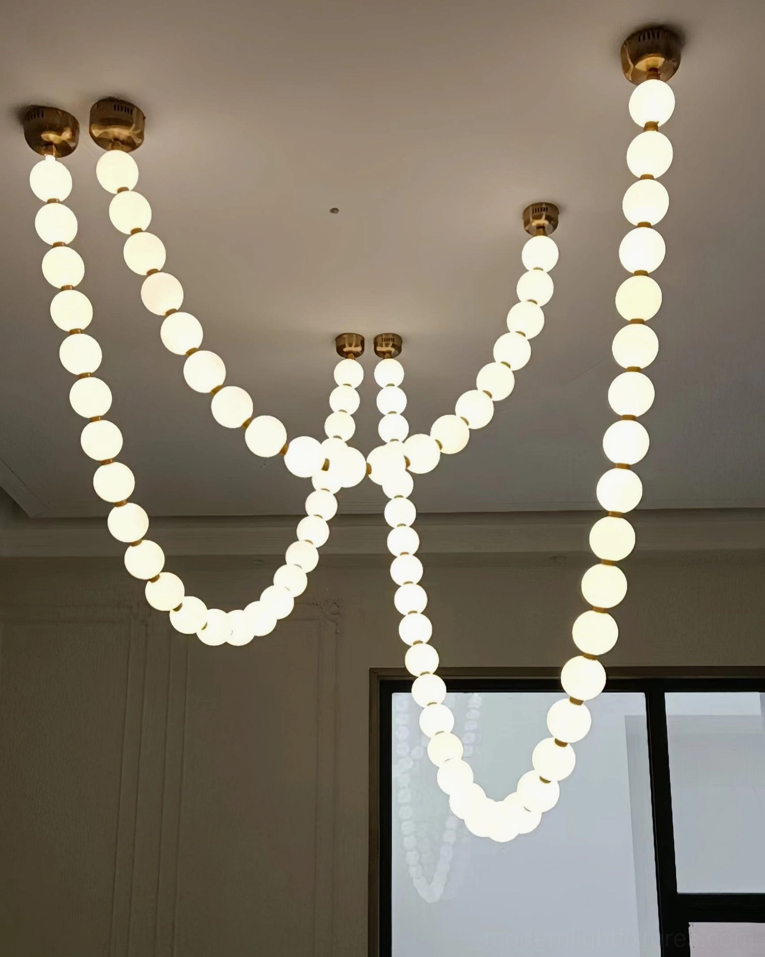 Contemporary pearl pendant light with IP20 rating suitable for indoor luxury spaces