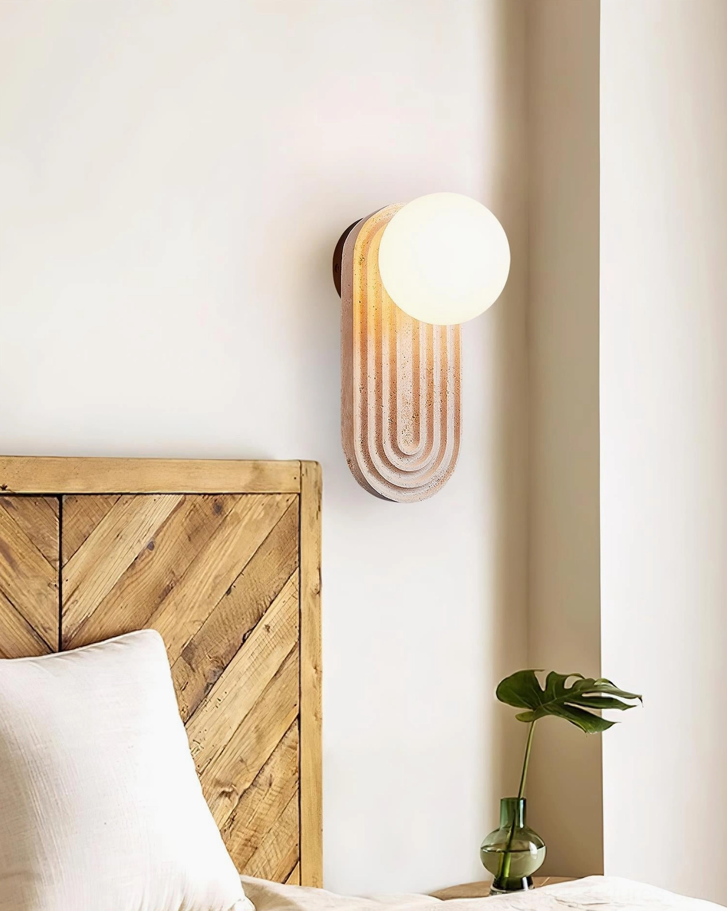 Pearla wall sconce side profile view travertine stone texture natural variations