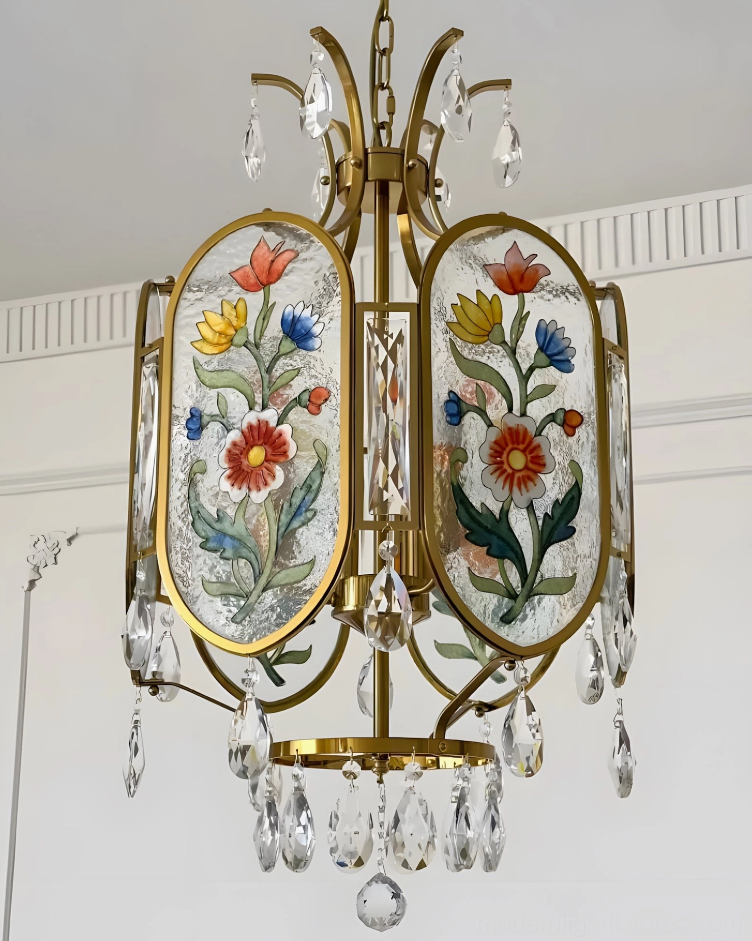 Jardinelle pendant light fixture demonstrating hanging chain adjustability and overall proportioned lantern silhouette design