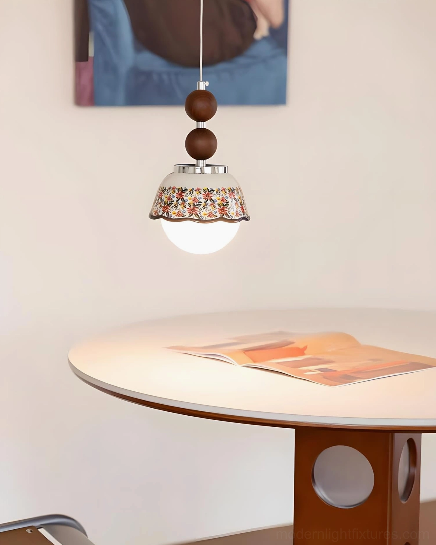 Bellora pendant fixture showing integrated warm white 3000K LED with ceramic floral shade and natural wood bead suspension details