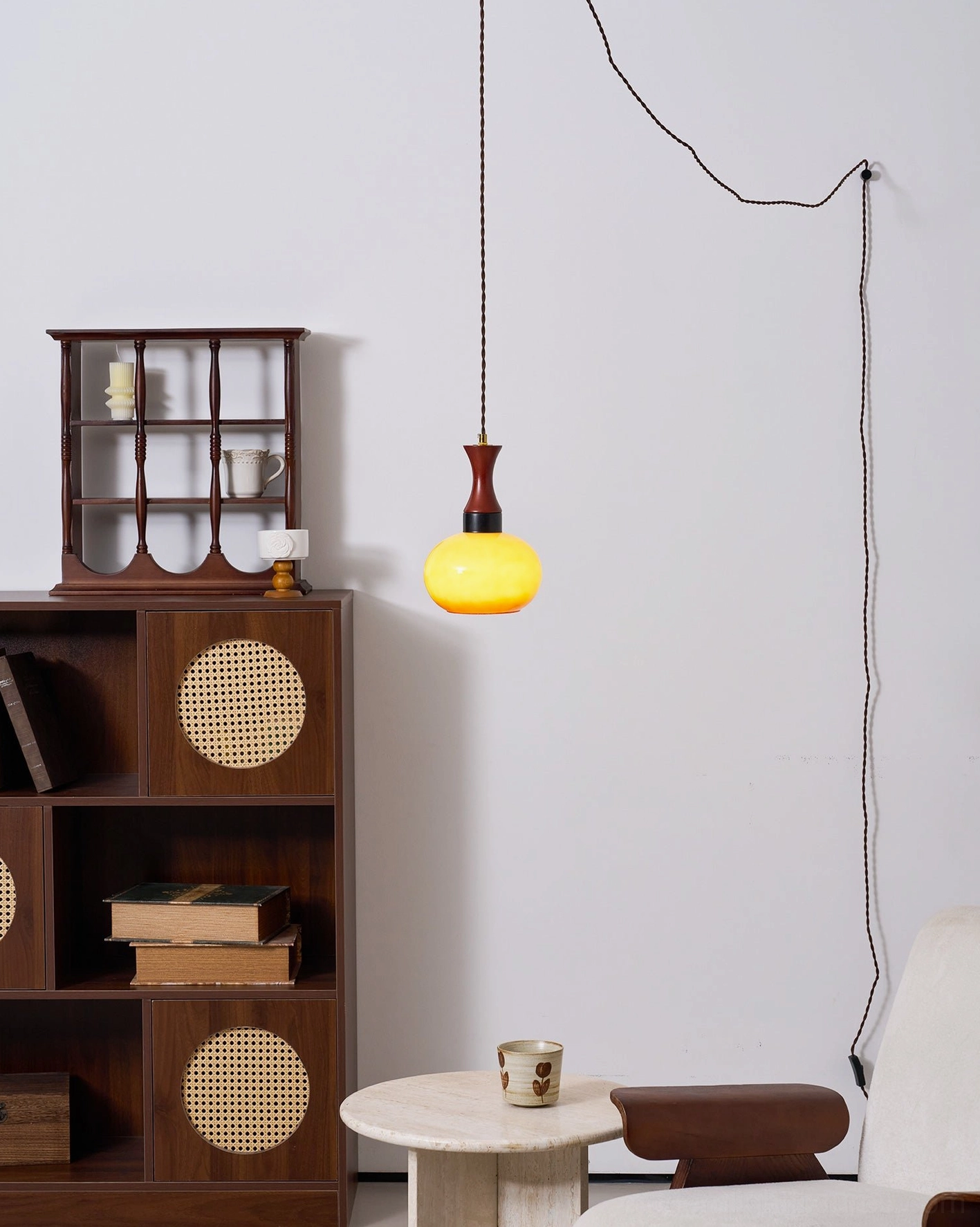 Chara pendant lamp showcasing adjustable cord and universal voltage compatibility