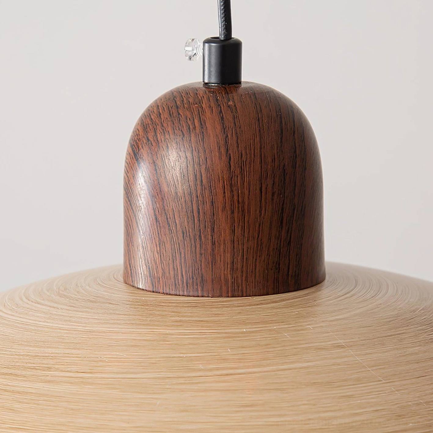 Pendant lamp creating soft diffused lighting with frosted glass shade