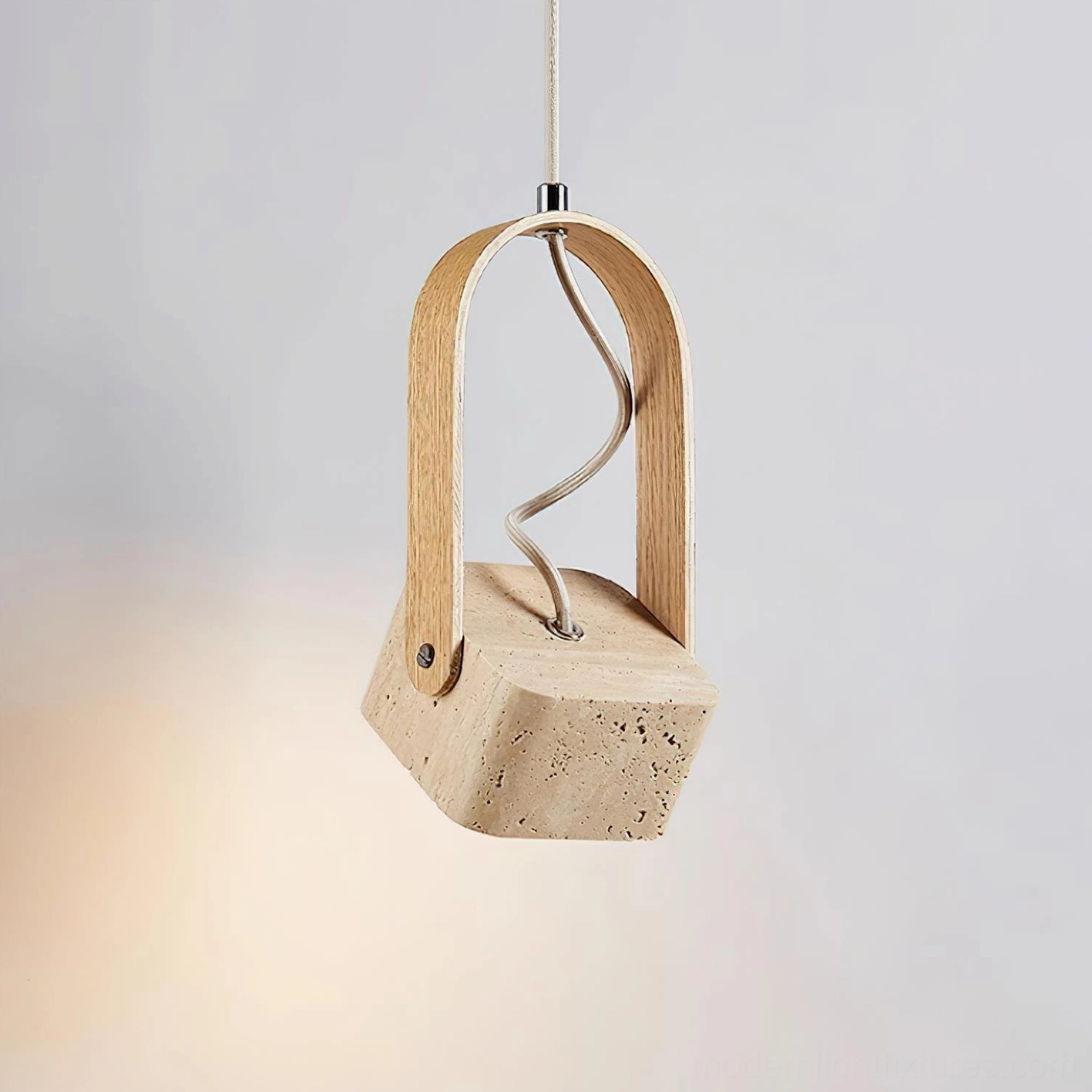 Leitura pendant light side angle view twisted metal wiring travertine stone detail
