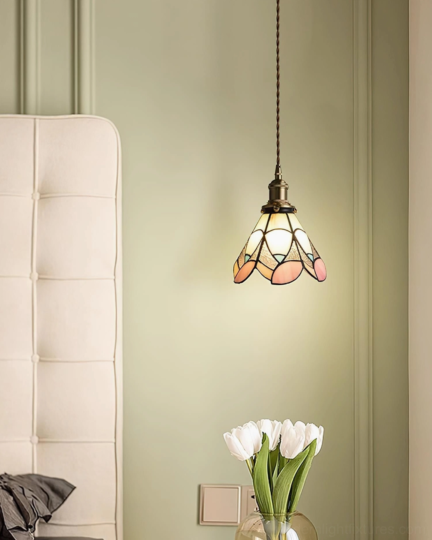 Pendant lamp with stained glass shade close-up revealing hand-soldered glass panel joints and vintage aesthetic