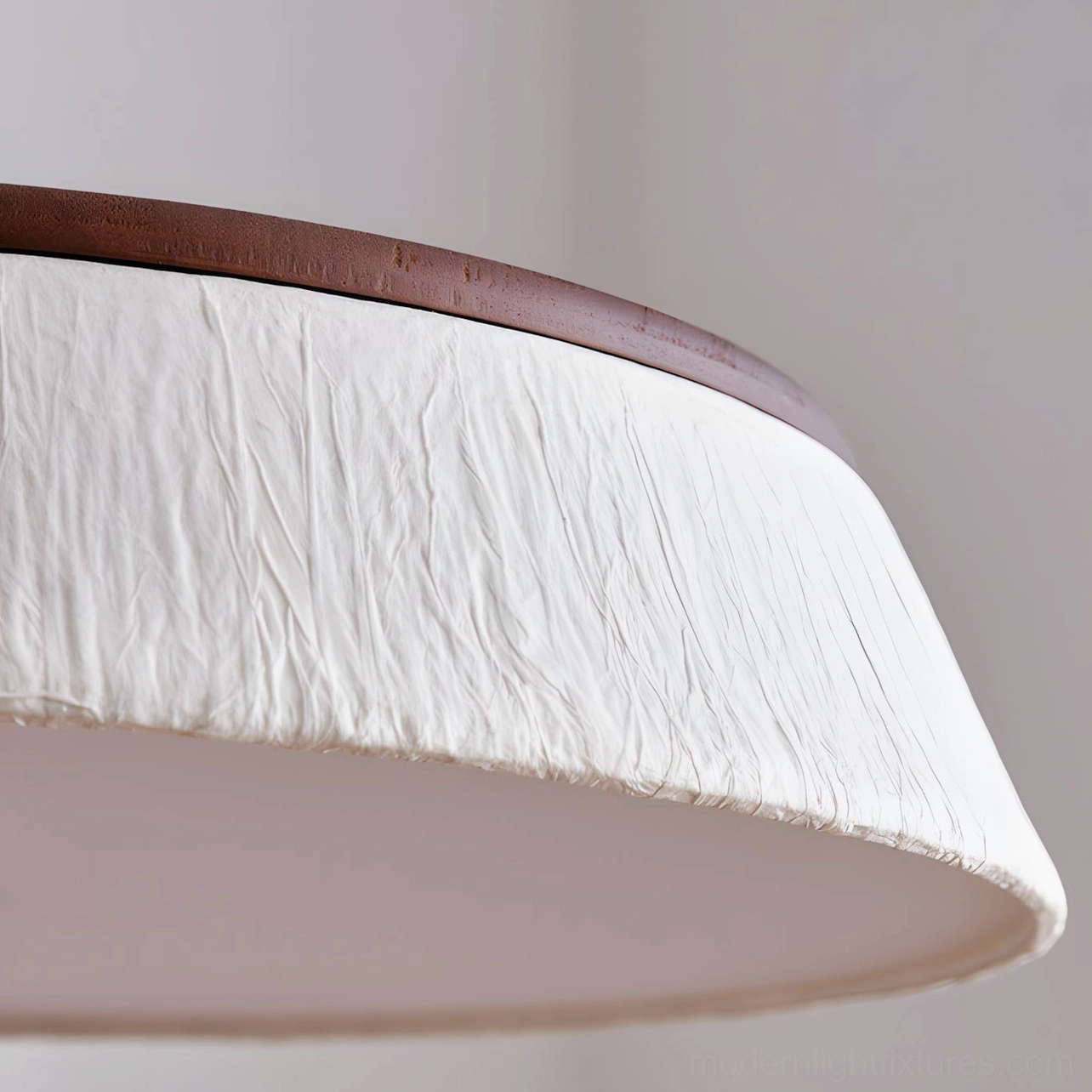 Adjustable cord detail on Japandi pendant light showing brown cord lead and brass socket holder ready for installation