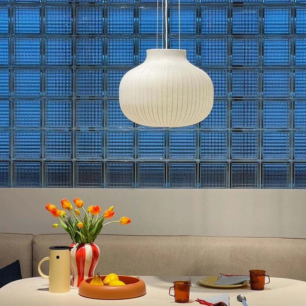 Ribbed pendant light with adjustable wire installation showing ceiling compatibility feature
