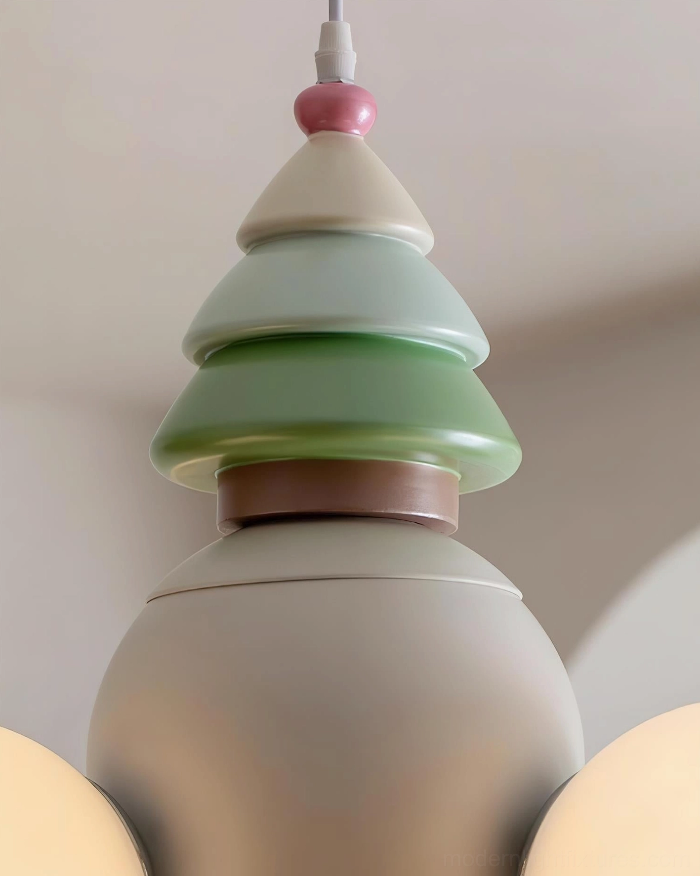 Close-up detail of layered pastel conical top decorative component of pendant fixture