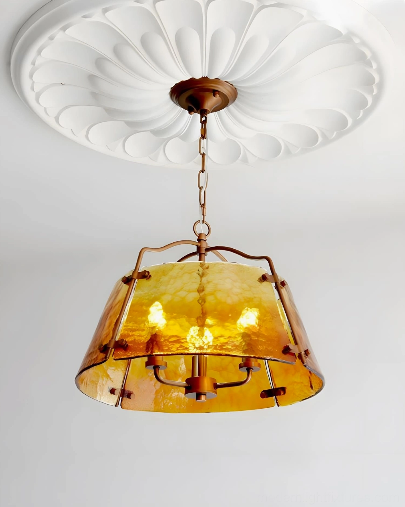 Pendant light with ornate embossed white ceiling rose medallion, antique copper hardware