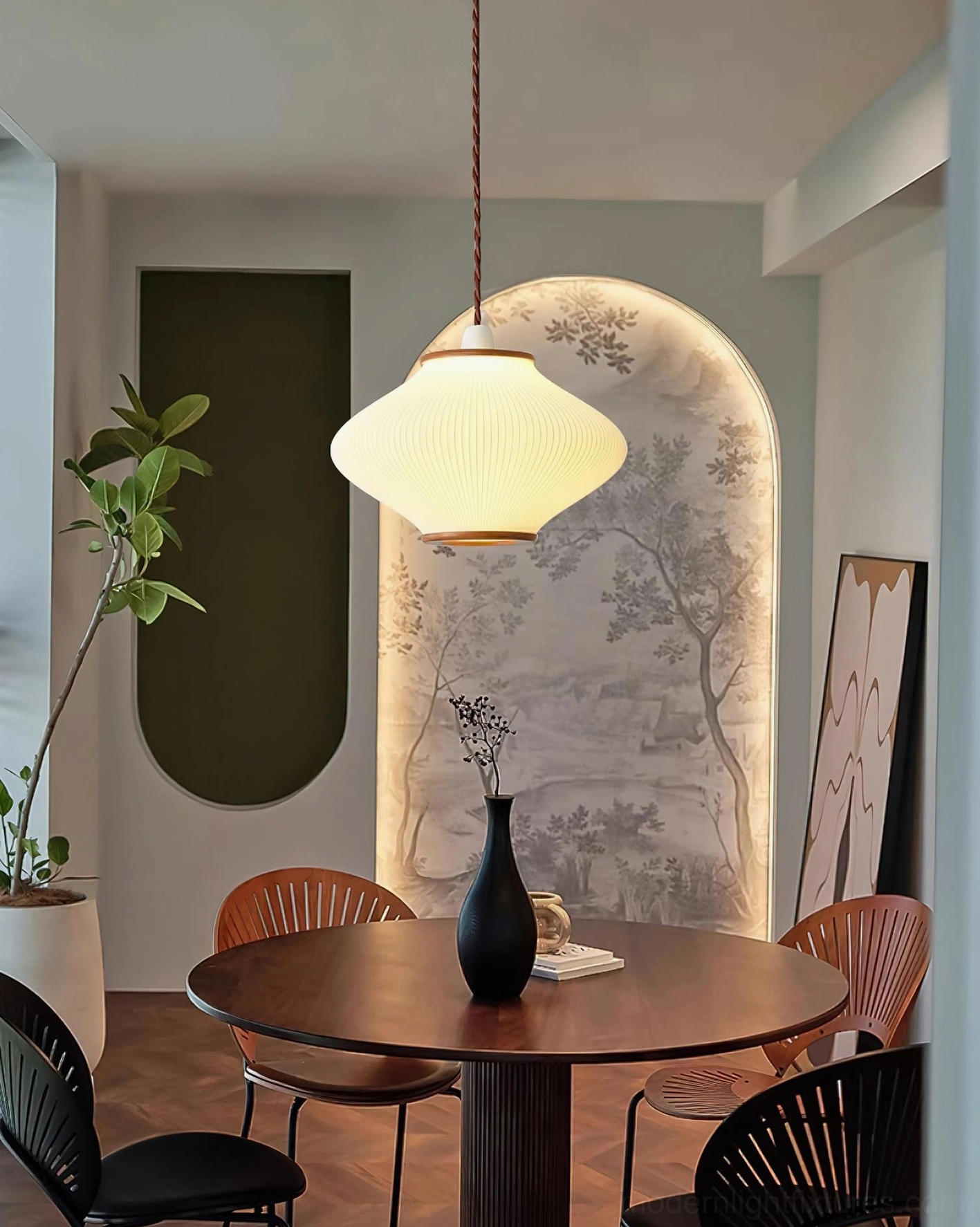 Modern ribbed acrylic pendant fixture in formal dining room with mural arch wall, warm earthy aesthetic