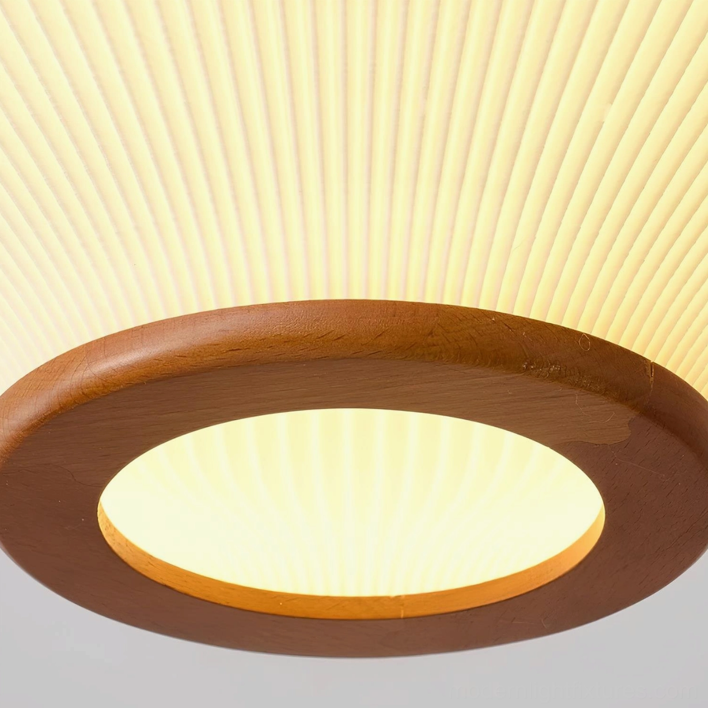 Japanese-inspired ribbed acrylic pendant light as room focal point, overall interior composition view