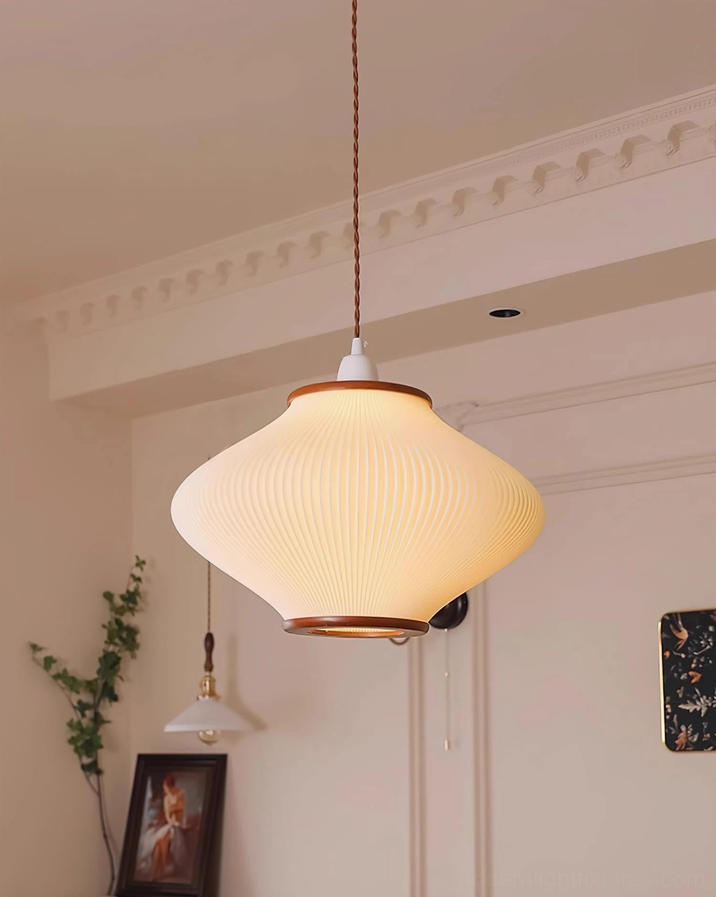 Modern Japanese-inspired pendant light with warm white glow in evening residential setting, atmosphere showcase