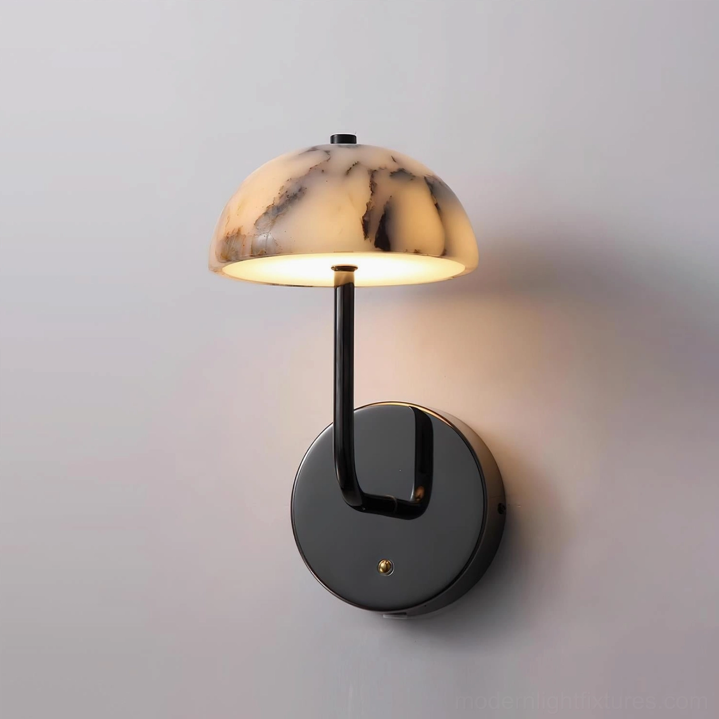 Penta marble dome wall sconce front three-quarter view showing installation base and screw detail