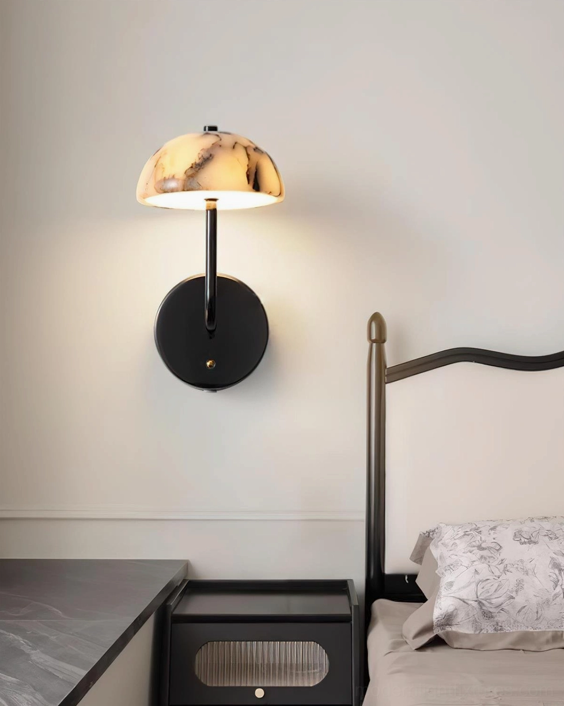 Penta wall lamp side view mounted in elegant bedroom corner with nightstand and bed styling