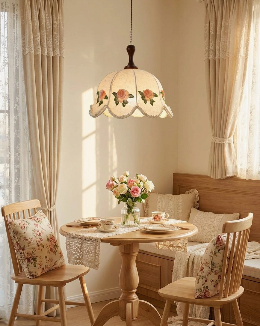 Peonelle pendant light with pearl-bead hem and embroidered roses, eye-level hanging in bedroom with warm wood accents