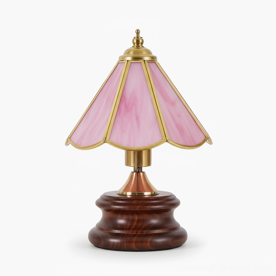 Peony pink scalloped stained glass table lamp front direct view on neutral background, showcasing petal-shaped glass design