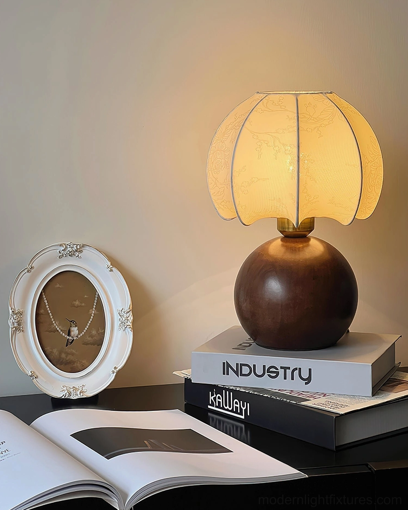 Vintage-inspired peony table lamp on home office desk with books and photo frame