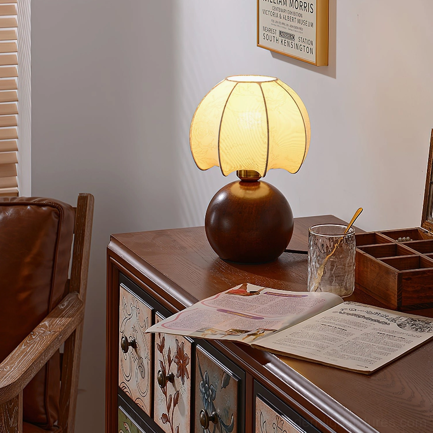 Peony table lamp side table near leather armchair in modern living room setting