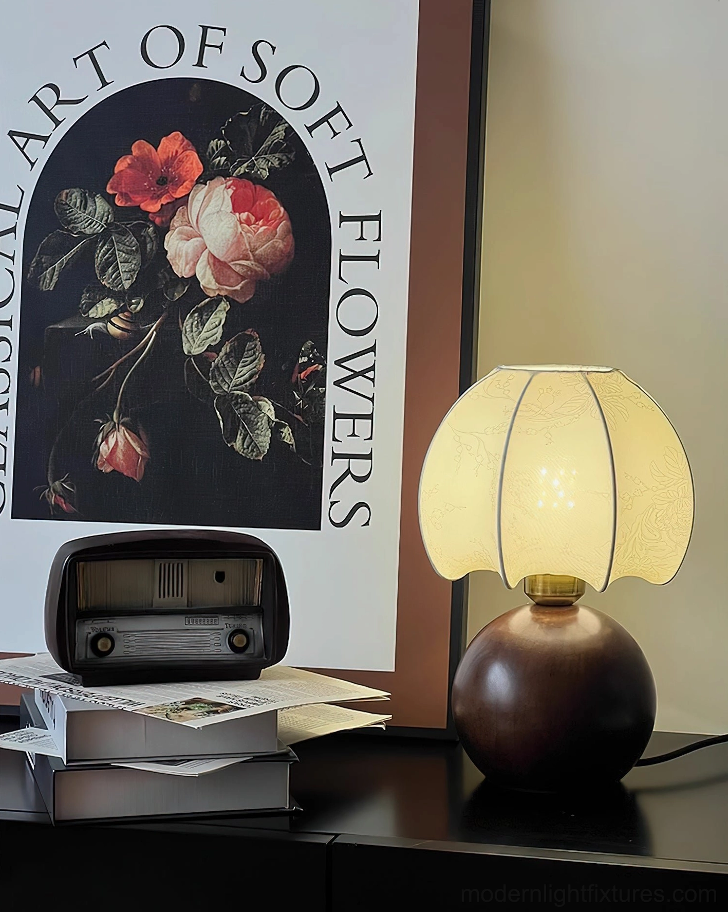 Illuminated peony table lamp on accent dresser with vintage radio and floral art