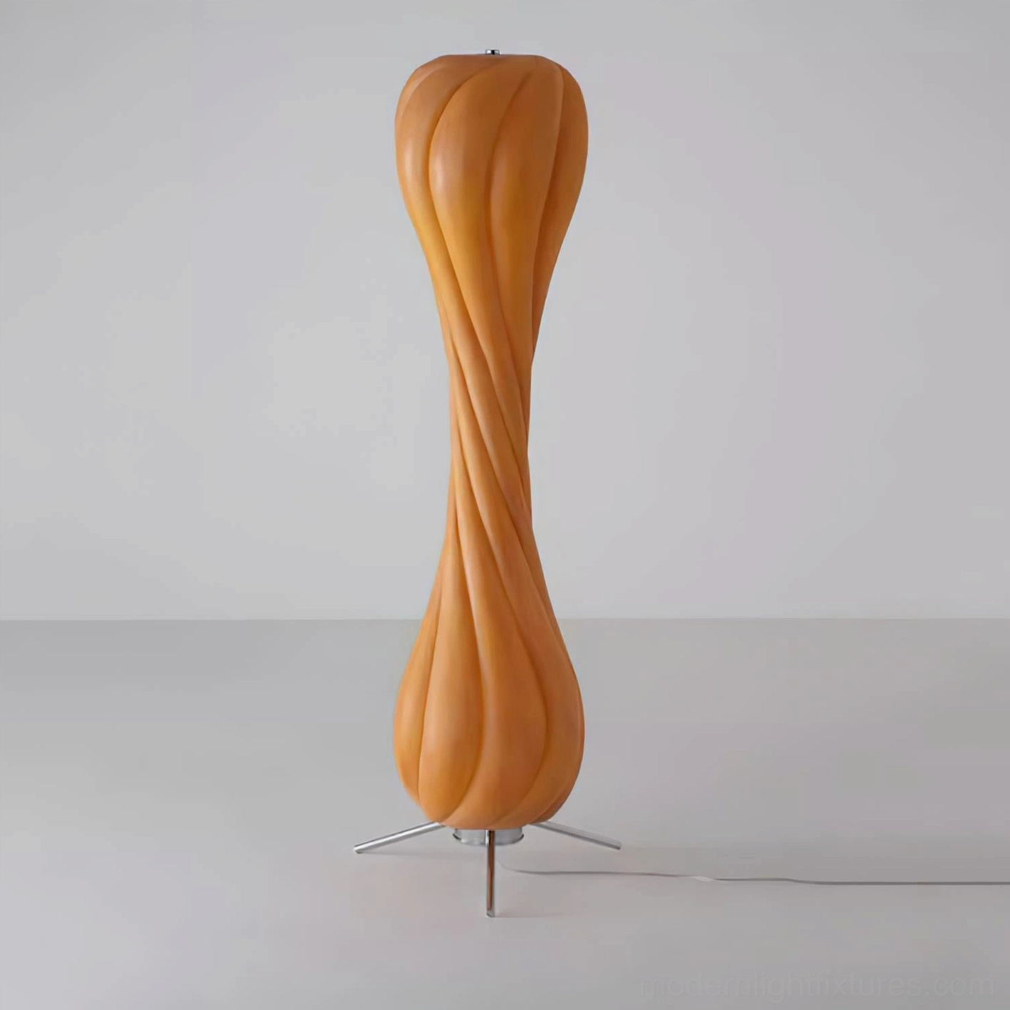 Pepperpod column floor lamp side angle showing spiral twisted silhouette and silver metal stand